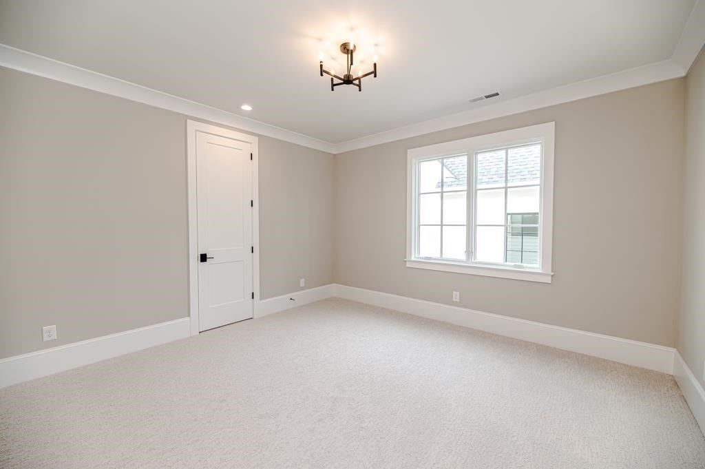 7920 Hardwick Drive Raleigh, NC 27615 - Photo 35 of 53 an empty room with a window