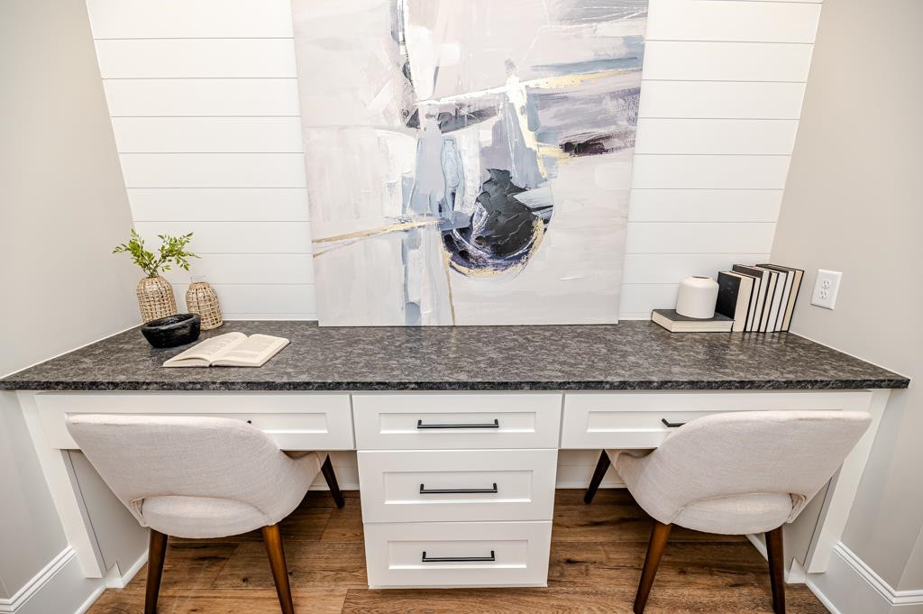 7920 Hardwick Drive Raleigh, NC 27615 - Photo 38 of 53 a kitchen with a table chairs and wooden floor
