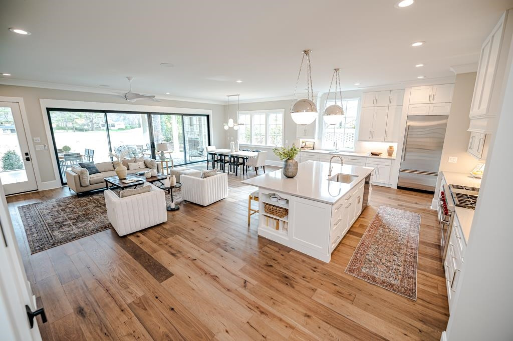 7920 Hardwick Drive Raleigh, NC 27615 - Photo 4 of 53 a living room with furniture large window and wooden floor