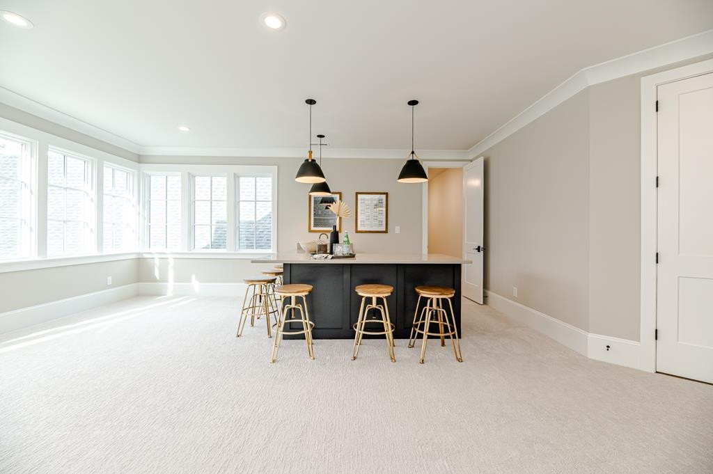 7920 Hardwick Drive Raleigh, NC 27615 - Photo 45 of 53 a view of a kitchen with furniture and window