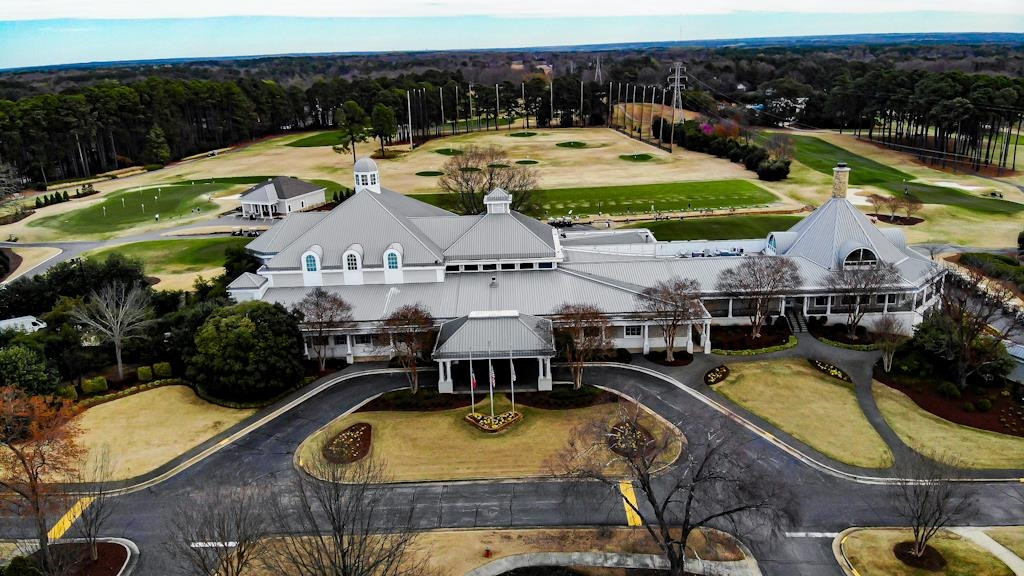 7920 Hardwick Drive Raleigh, NC 27615 - Photo 50 of 53 an aerial view of a house with swimming pool and outdoor seating