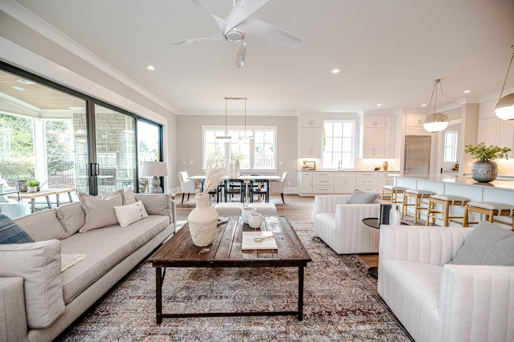 7920 Hardwick Drive Raleigh, NC 27615 - Photo 5 of 53 a living room with lots of furniture and a large window
