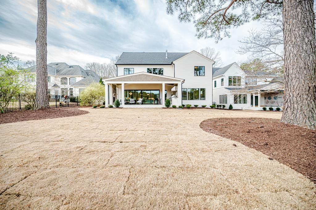7920 Hardwick Drive Raleigh, NC 27615 - Photo 53 of 53 a front view of residential houses with yard and trees around