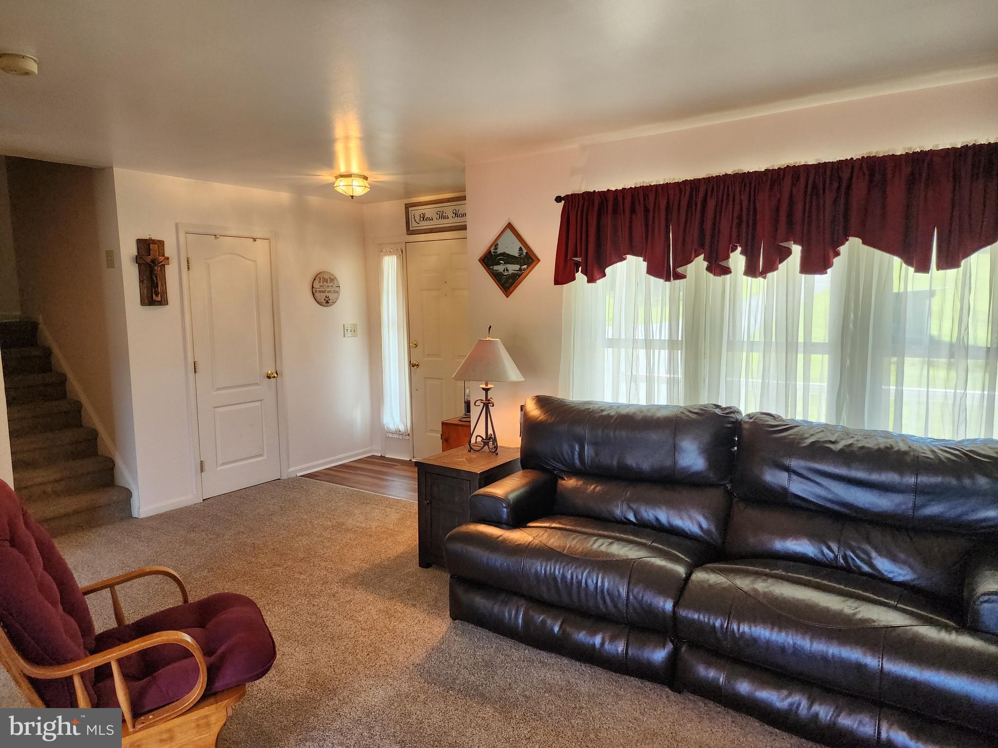 12407 Swain Road Little Orleans, MD 21766 - Photo 29 of 77 Living Room Shows Stairs to Upper Level