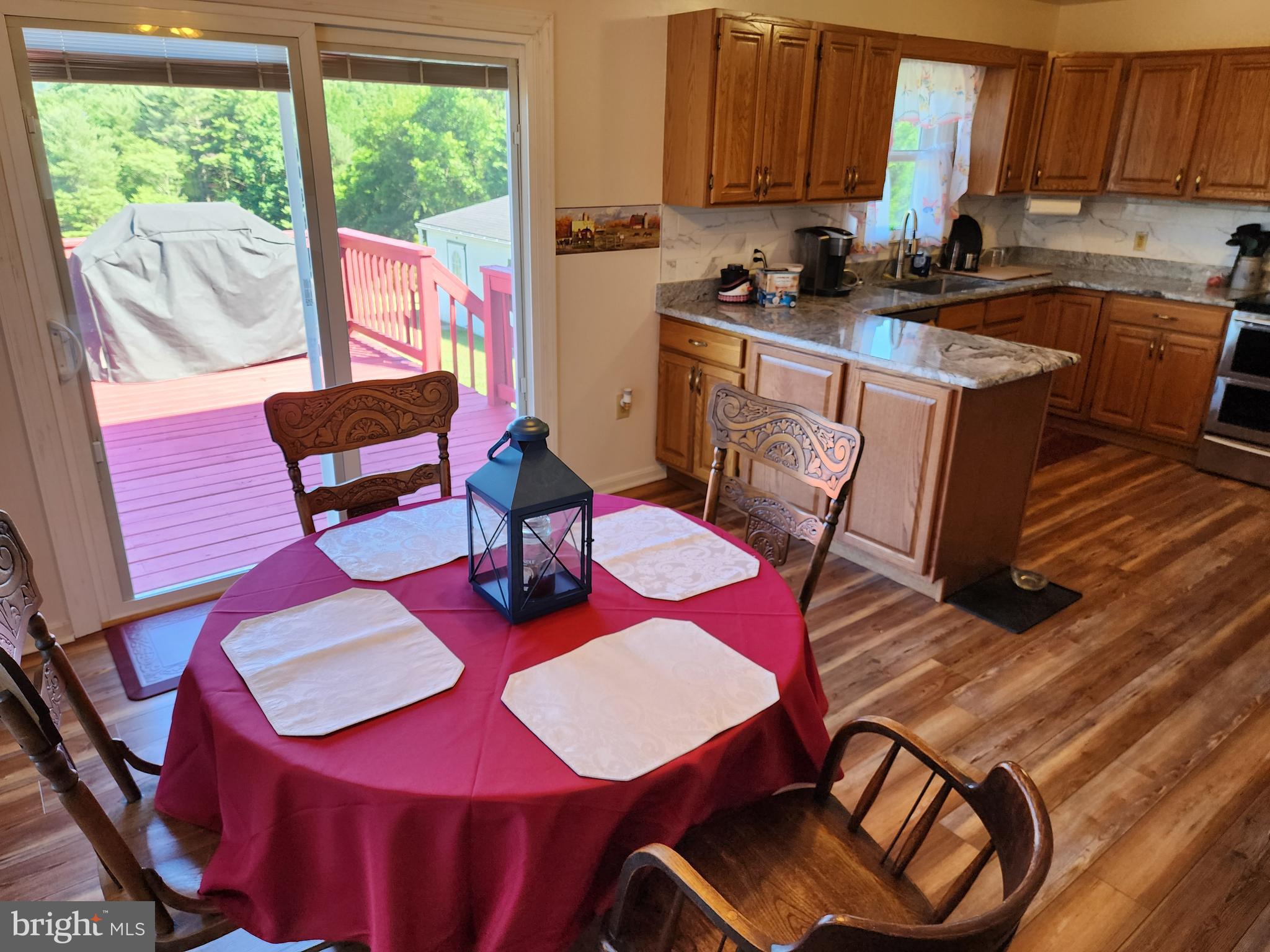 12407 Swain Road Little Orleans, MD 21766 - Photo 33 of 77 Dining Area/Room Exit to 12' X 14' Deck