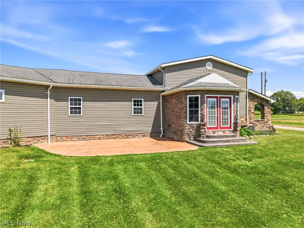 26648 Highway 172 East Rochester, OH 44625 - Photo 2 of 46 Shows exit from kitchen/dining area and a patio