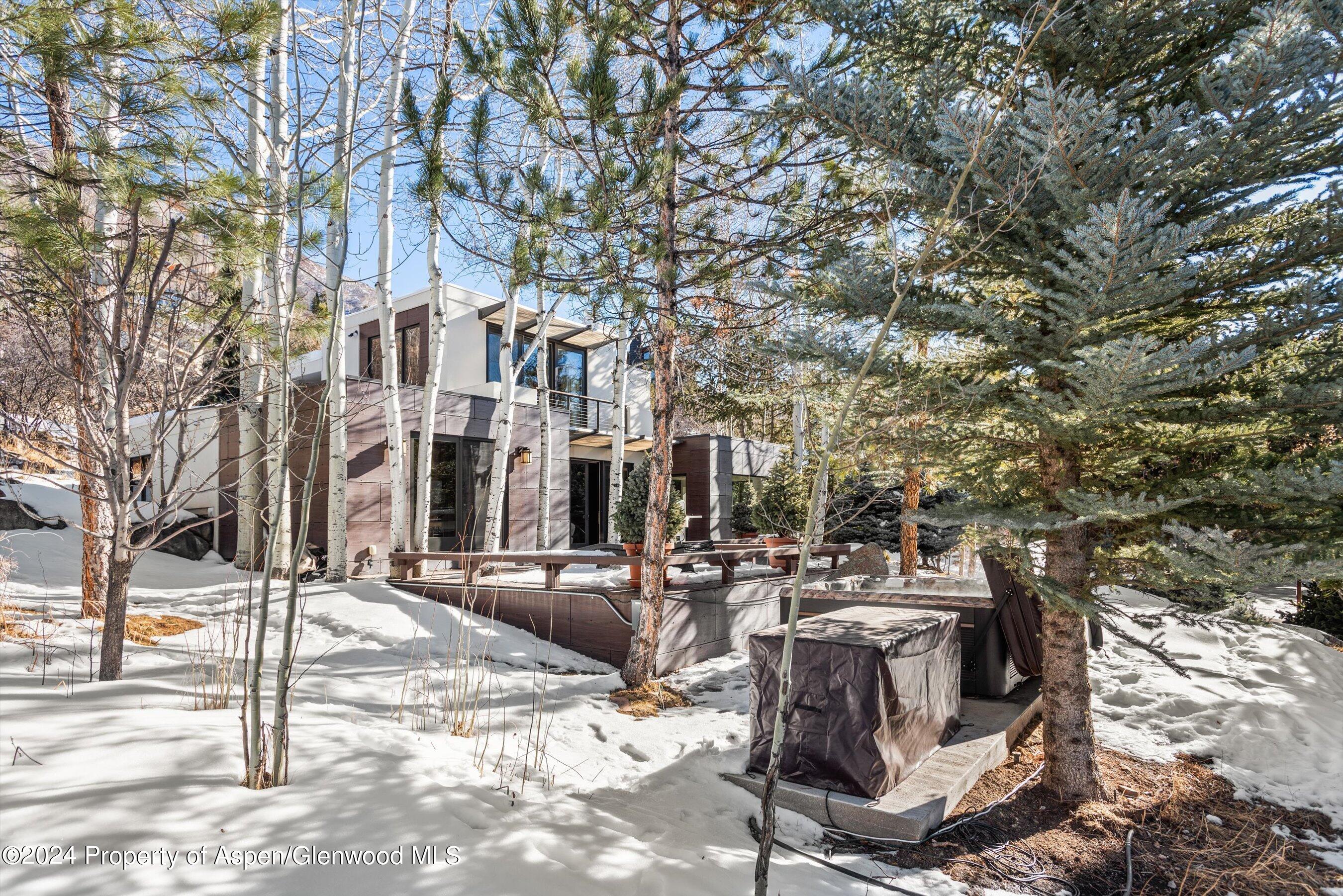 25 Nighthawk Drive Aspen, CO 81611 - Photo 2 of 34 a view of a building with cars park