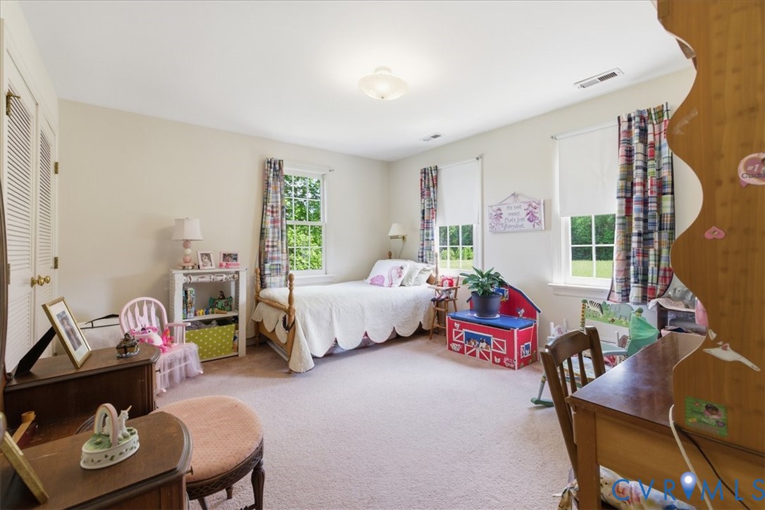 15414 Sunnybrook Road Petersburg, VA 23805 - Photo 22 of 29 a bedroom with furniture and a bed