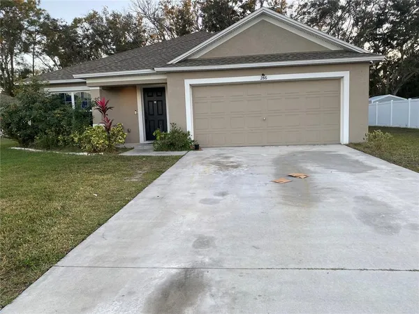 a front view of house with yard