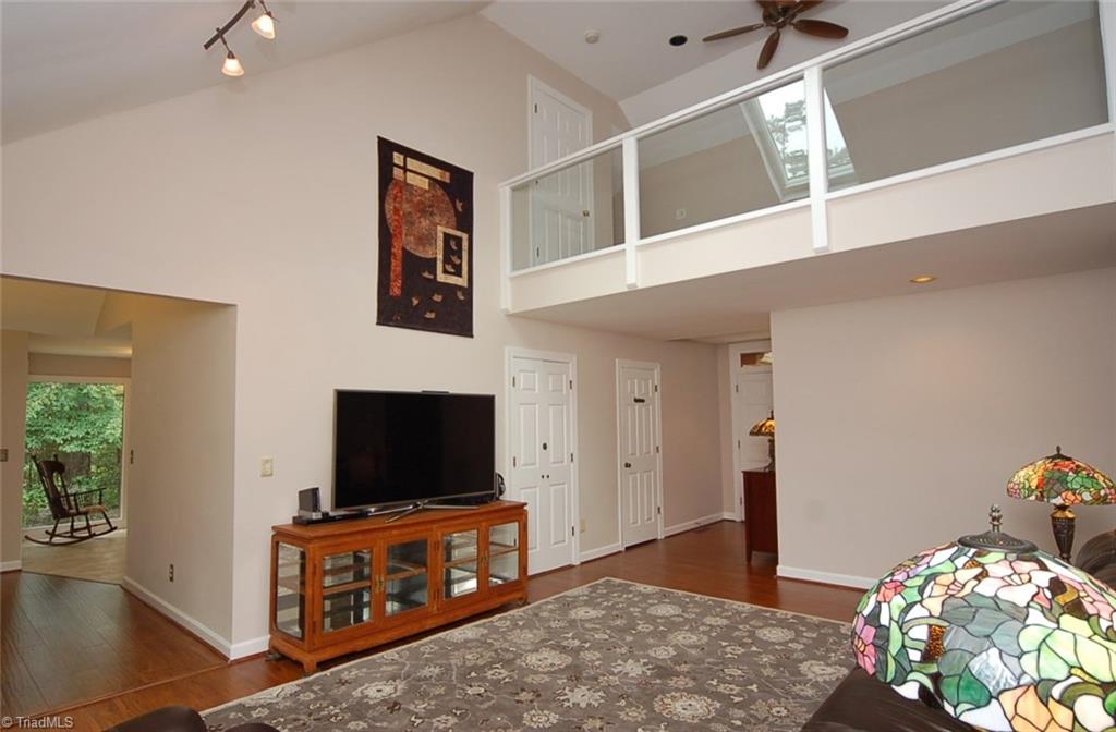 1400 Whites Mill Road High Point, NC 27265 - Photo 14 of 30 Two story vaulted ceiling with loft space and skylight above.