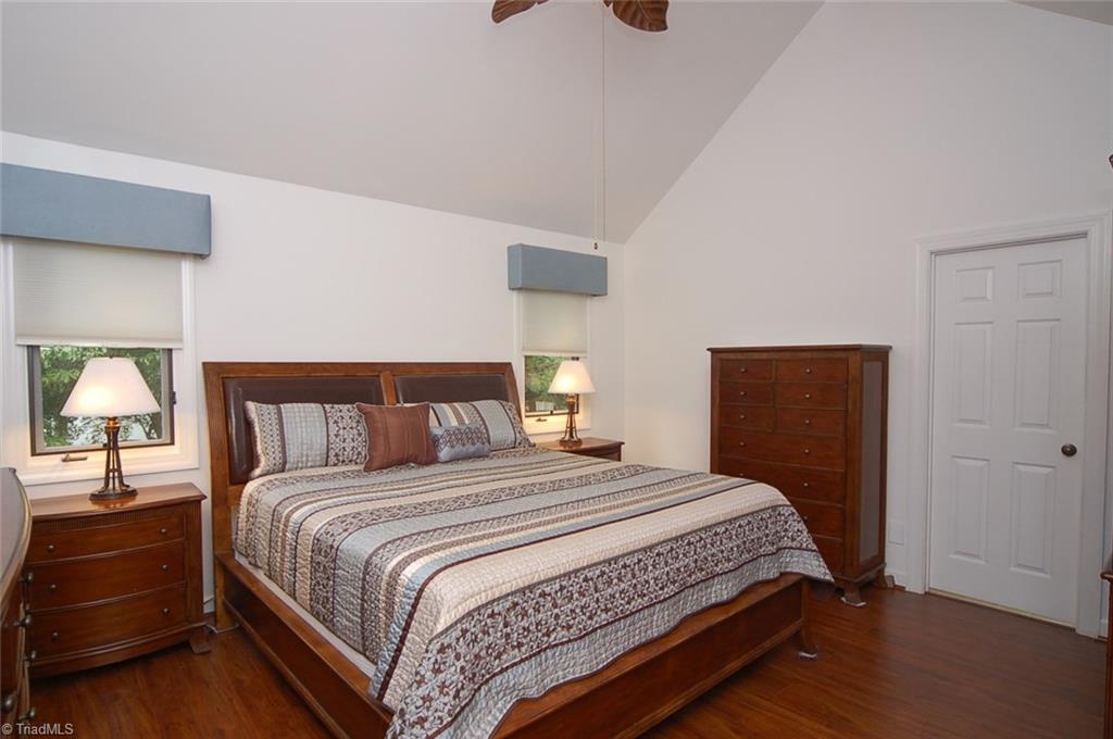 1400 Whites Mill Road High Point, NC 27265 - Photo 17 of 30 Main level master bedroom with vaulted ceiling