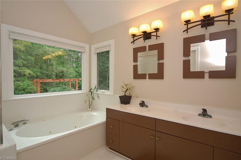 1400 Whites Mill Road High Point, NC 27265 - Photo 19 of 30 Master bath with dual vanities and soaking tub
