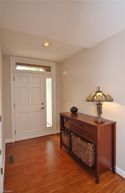 1400 Whites Mill Road High Point, NC 27265 - Photo 4 of 30 New laminate flooring in 2014.