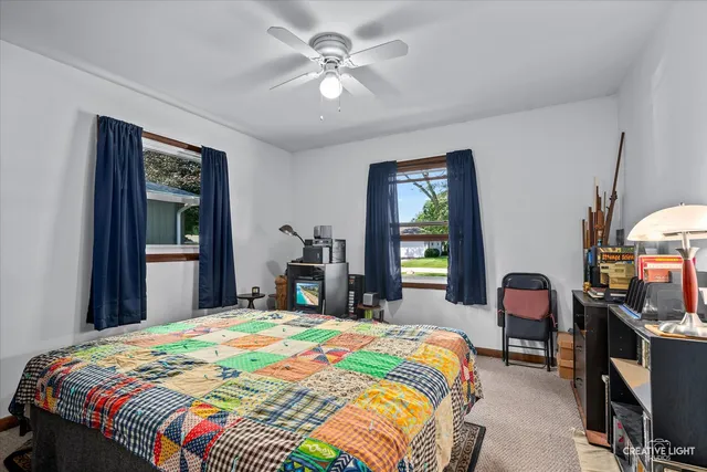 a backyard of a house with seating space