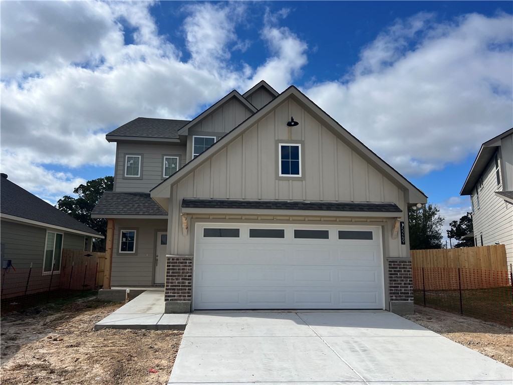 a view of a house with a garage