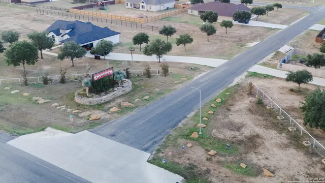 a view of a wooden floor with a bench
