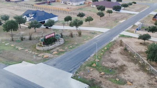 a view of a wooden floor with a bench
