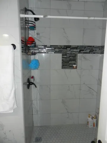 a bathroom with a sink and mirror