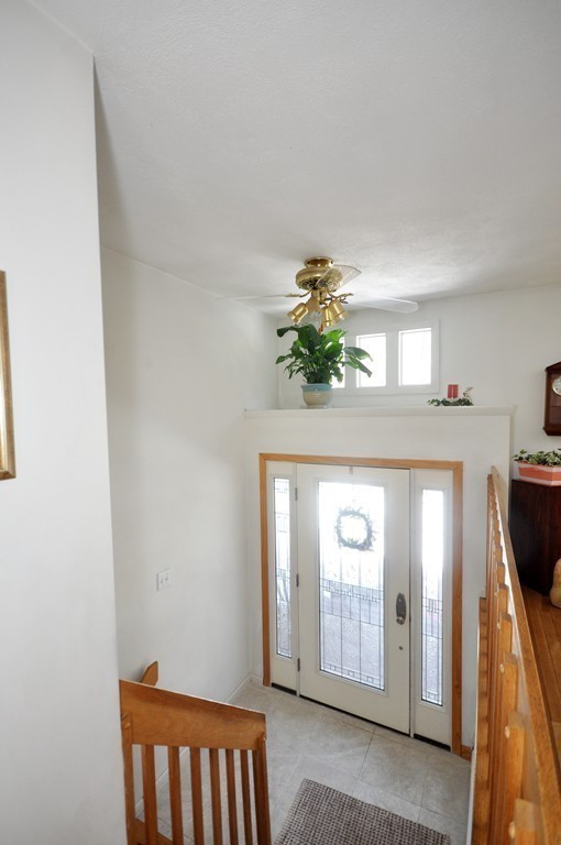 174 Hudson Road Stow, MA 01775 - Photo 18 of 29 a view of an entryway with wooden floor