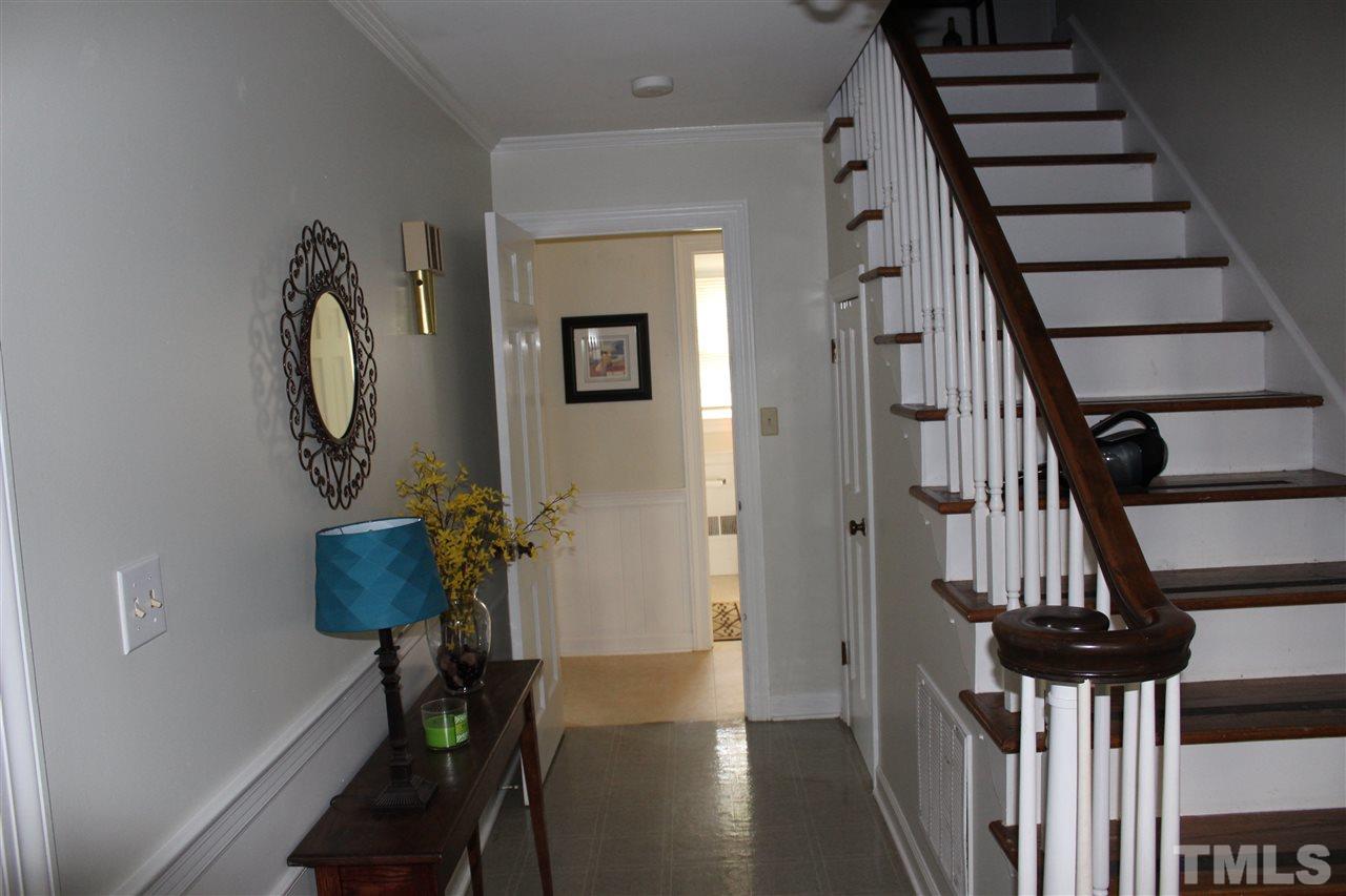 4204 Redington Drive Raleigh, NC 27609 - Photo 3 of 10 a view of entryway with wooden floor
