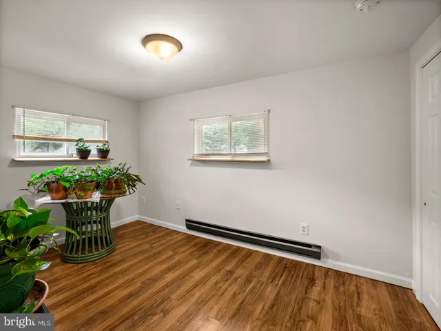 a room with furniture and a window