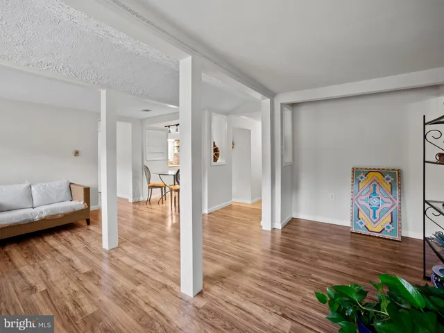 a view of livingroom with furniture and wooden floor