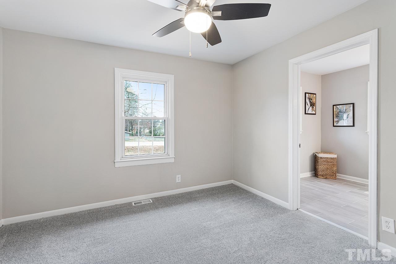 3915 Butler Boulevard Raleigh, NC 27604 - Photo 15 of 30 a view of an empty room with a window
