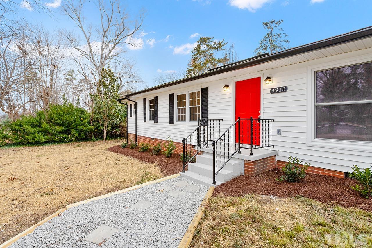 3915 Butler Boulevard Raleigh, NC 27604 - Photo 2 of 30 a view of a house with a patio