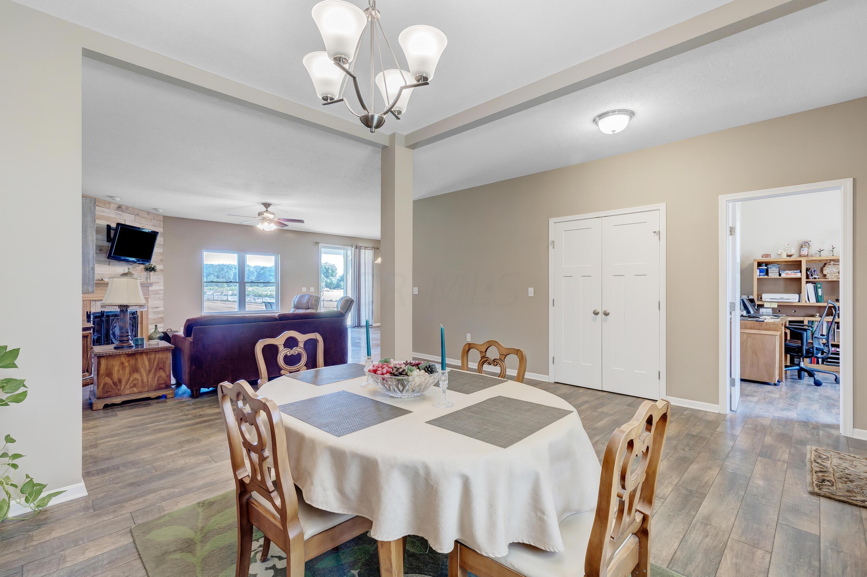 • Laminate flooring • Tan painted walls • Chandelier