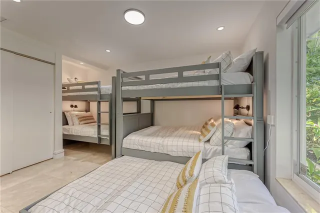 a bathroom with a sink vanity and mirror