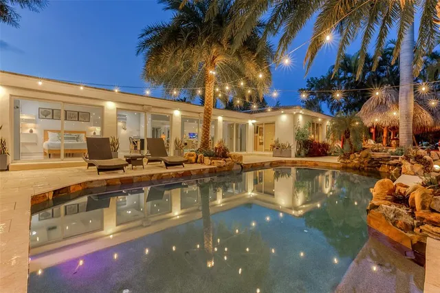 a view of a chairs and table in the patio