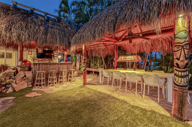 a view of a lake with boats and trees in the background