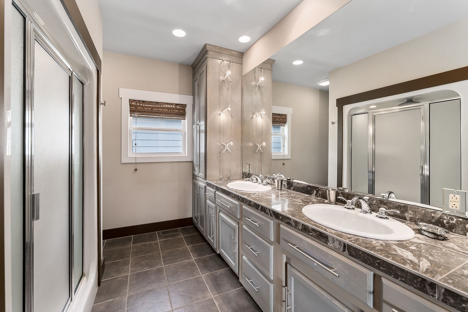 140 Sandgate Drive Smithville, TN 37166 - Photo 27 of 49 a bathroom with a granite countertop sink a mirror and a shower