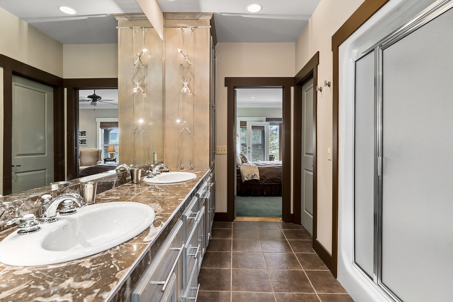 140 Sandgate Drive Smithville, TN 37166 - Photo 28 of 49 a en suite bathroom with a double vanity sink and a mirror