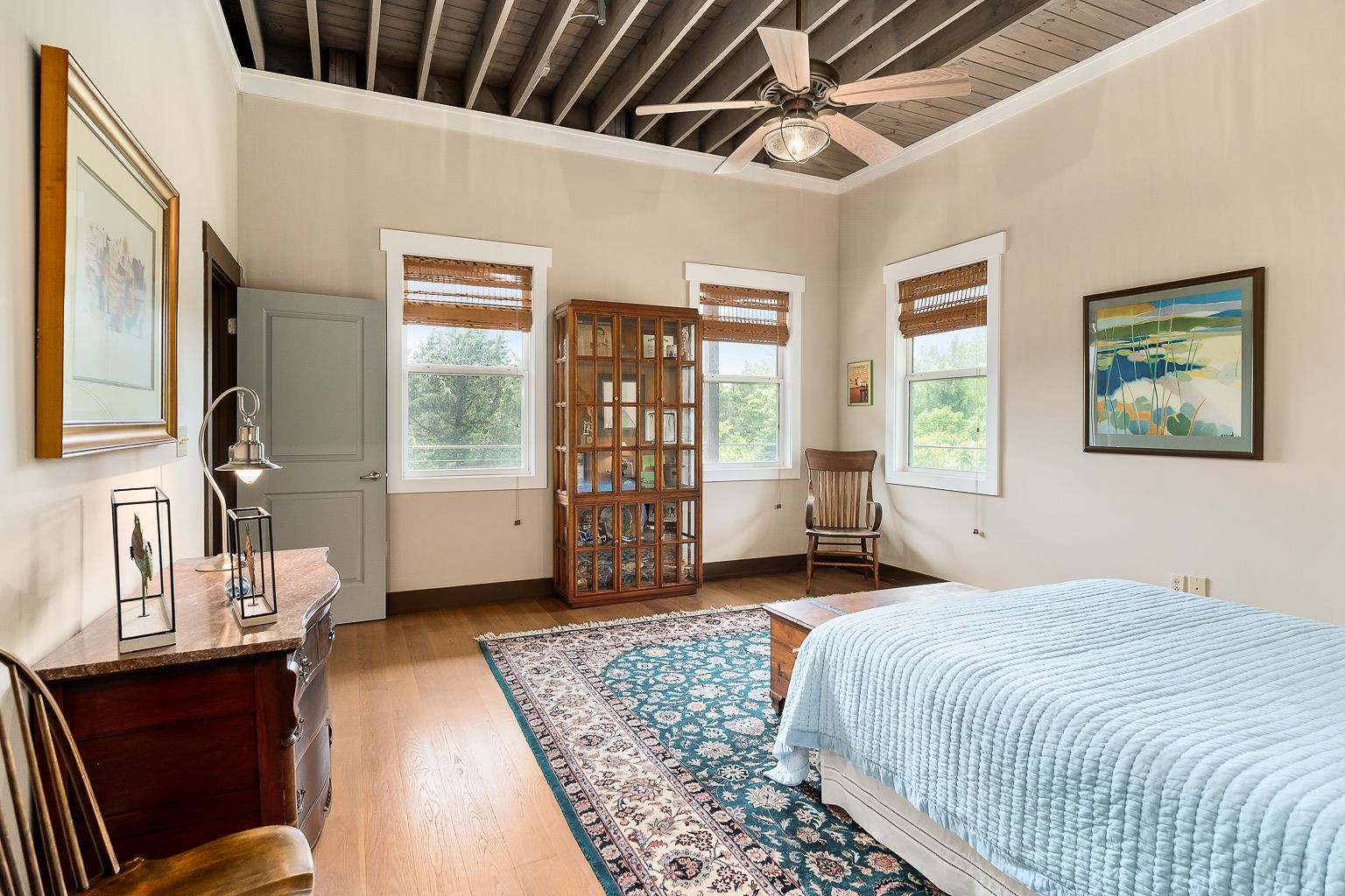 140 Sandgate Drive Smithville, TN 37166 - Photo 35 of 49 a spacious bedroom with a bed a couch and a large window with the outer view