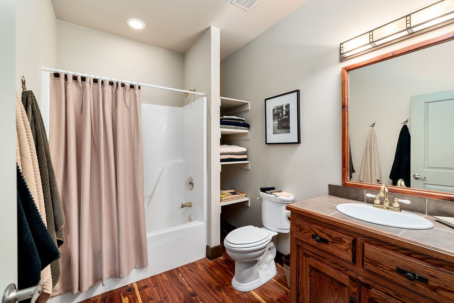 140 Sandgate Drive Smithville, TN 37166 - Photo 37 of 49 a bathroom with a sink a toilet and a mirror