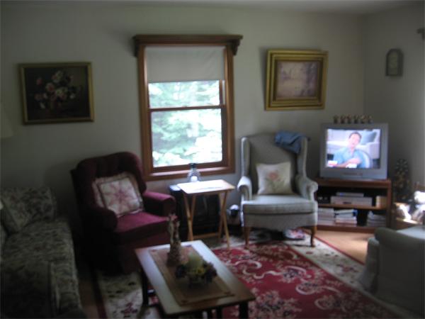 44 Old Main Road Worthington, MA 01098 - Photo 11 of 15 a living room with furniture and a flat screen tv
