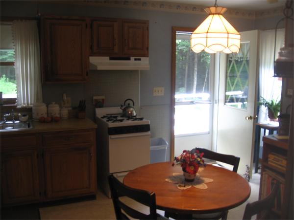 44 Old Main Road Worthington, MA 01098 - Photo 14 of 15 a dining room with furniture and window