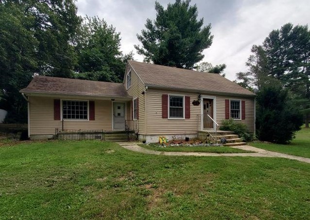 45 School House Hl Road Raphine, VA 24472 - Photo 14 of 14 a front view of a house with a garden