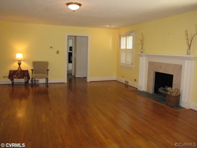 4009 Farmville Road Farmville, VA 23901 - Photo 4 of 14 a view of a livingroom with furniture and a fireplace