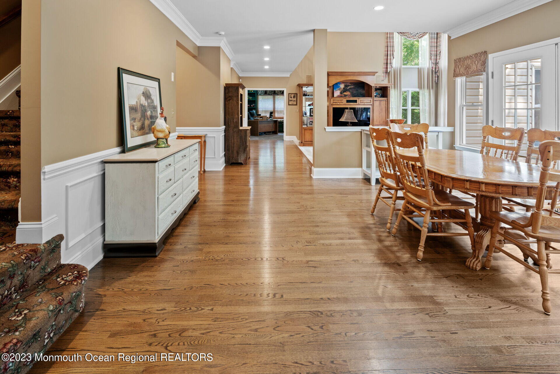 81 Agress Road Millstone Township, NJ 08535 - Photo 16 of 35 a living room with furniture a fireplace and a flat screen tv
