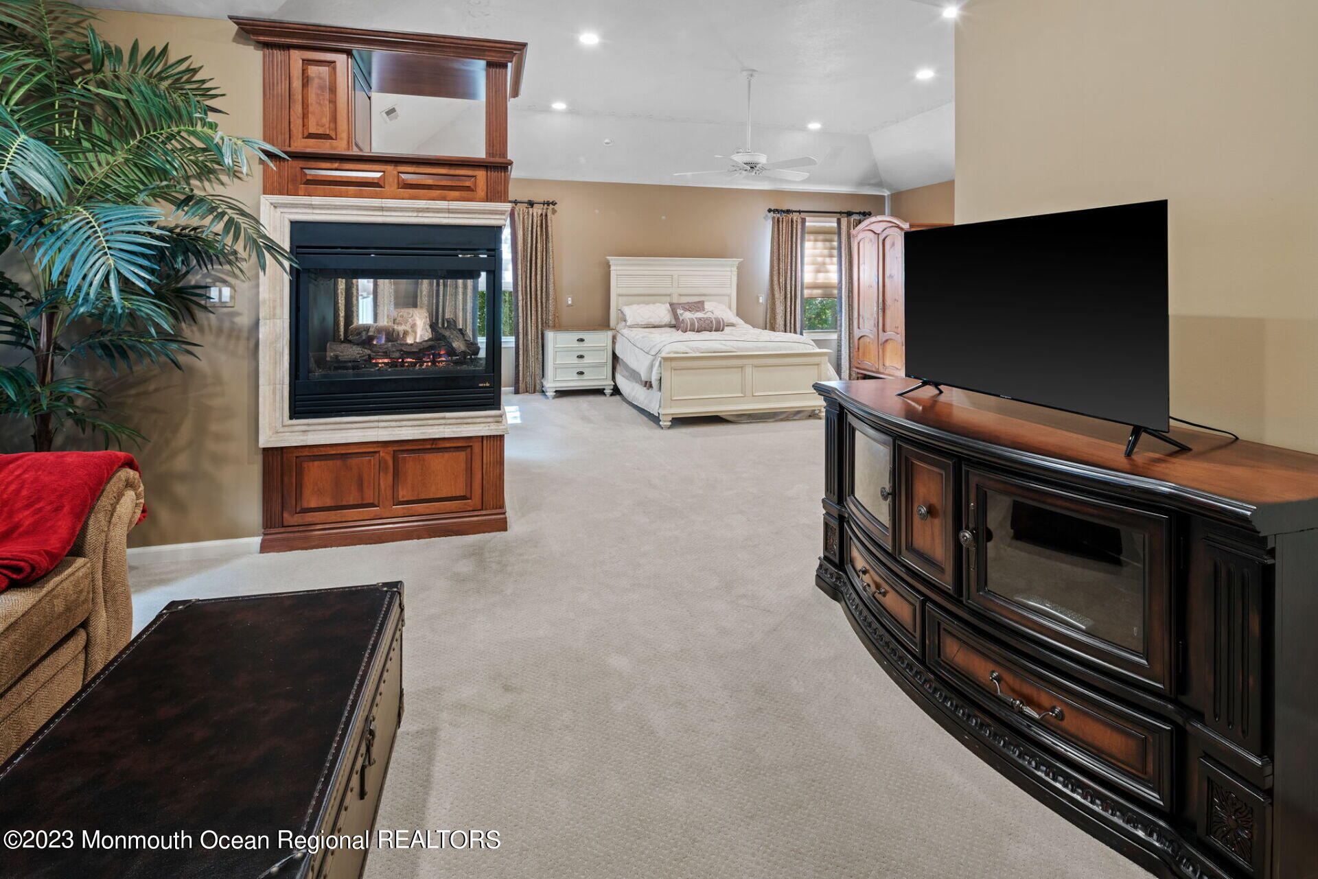 81 Agress Road Millstone Township, NJ 08535 - Photo 21 of 35 a living room with furniture and a flat screen tv