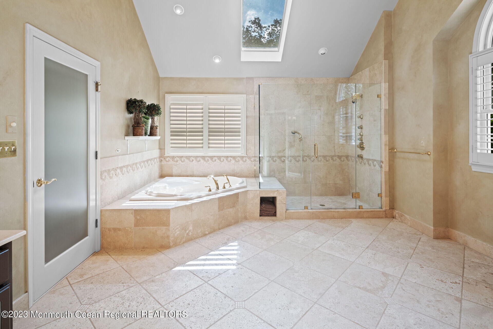 81 Agress Road Millstone Township, NJ 08535 - Photo 23 of 35 a bathroom with a tub shower and checkered floor