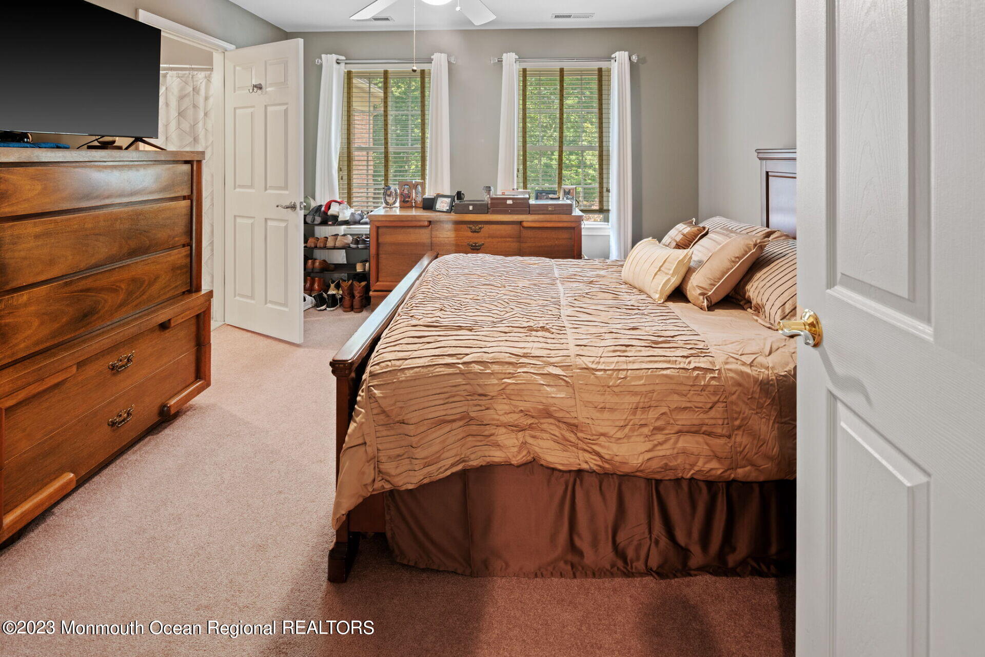 81 Agress Road Millstone Township, NJ 08535 - Photo 27 of 35 a bed sitting in a bedroom next to a window