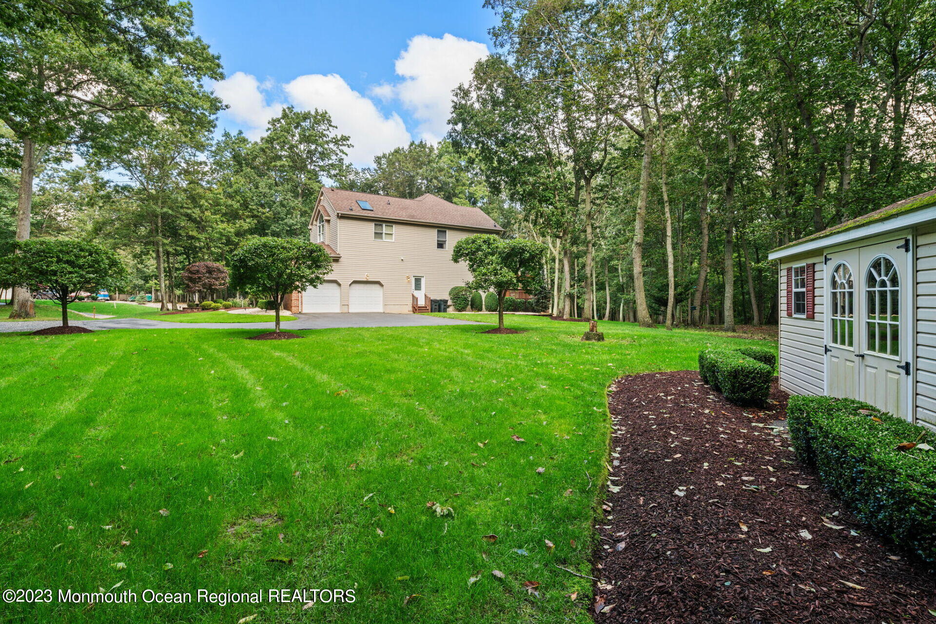 81 Agress Road Millstone Township, NJ 08535 - Photo 30 of 35 a view of a patio with a big yard and potted plants