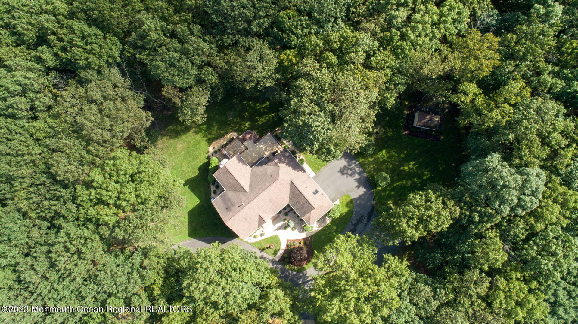 81 Agress Road Millstone Township, NJ 08535 - Photo 34 of 35 an aerial view of a house with yard