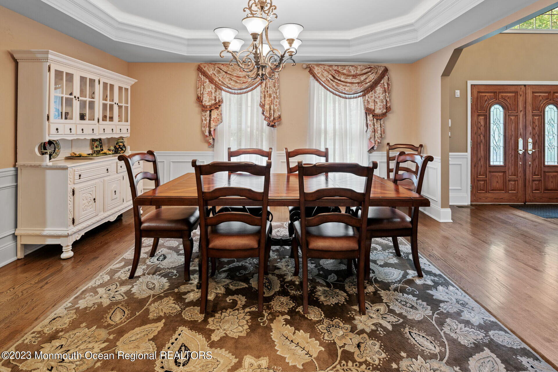81 Agress Road Millstone Township, NJ 08535 - Photo 7 of 35 a view of a dining room with furniture and wooden floor