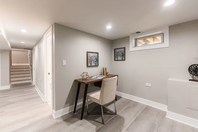 a workspace with wooden floor