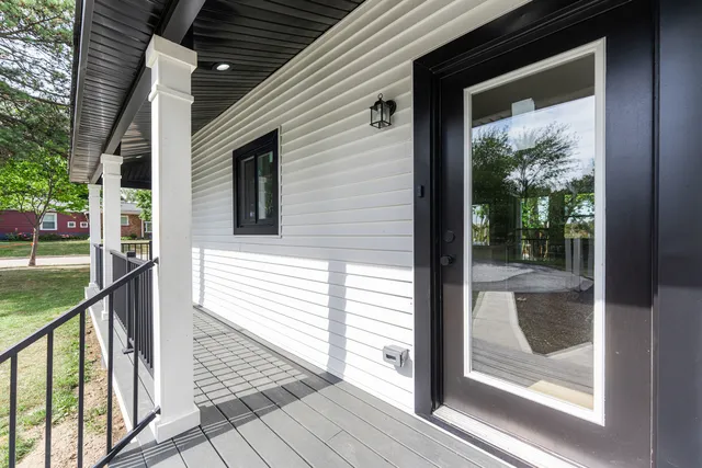 a front view of a house with a porch