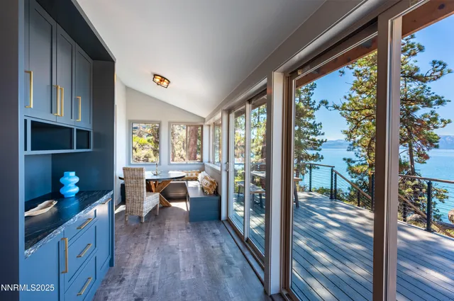 a living room with fireplace furniture and a flat screen tv